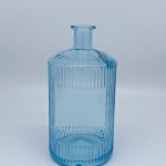 Blue painted bottle with embossed ribbons
