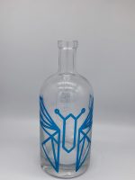 Logo embossed bottle with silk screen printing