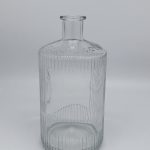 Customized bottle with embossed ribbons